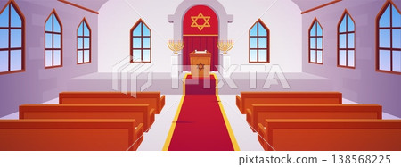 Empty synagogue interior with benches, an altar with an aron kodesh, and a Star of David. 138568225