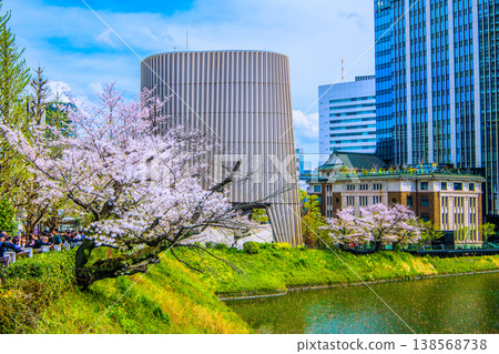 The urban landscape of Tokyo, Japan: We must never forget that tragedy... A view of the Showa-kan building in front of Kudanshita Station. Cherry blossom season is coming again... = 6th 138568738