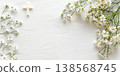 First communion white gypsophila floral banner background with subtle cross and textured plaster surface for horizontal invitation design. Copy space. Frame for wedding or birthday. Happy Easter 138568745