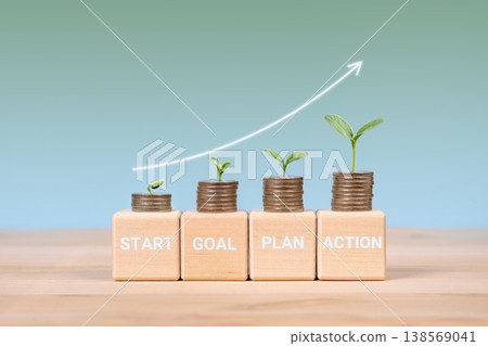Wooden blocks, seedling, stacks of coins with white arrow pointing up as concept of success strategy with words start, plan, action as symbol goal achievement, business project management workflow Wooden blocks, seedling, stacks of coins with white arrow pointing up as concept of success strategy with words start, plan, action as symbol goal achievement, business project management workflow 138569041