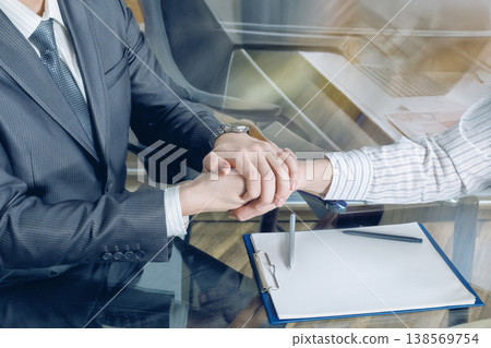 Firm handshake Firm handshake 138569754