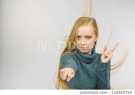 Woman pointing and shaking her finger Woman pointing and shaking her finger 138569768