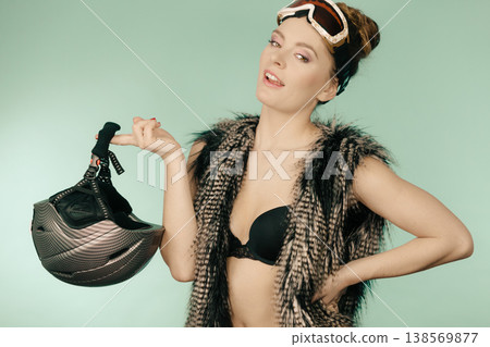 Woman wearing sexy winter sport outfit Woman wearing sexy winter sport outfit 138569877