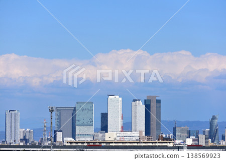 A distant view of the cluster of skyscrapers around Nagoya Station and cumulus clouds floating in the blue sky (4) A distant view of the cluster of skyscrapers around Nagoya Station and cumulus clouds floating in the blue sky (4) 138569923