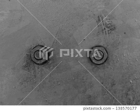 Detailed closeup of screw on indrustrial machinery 138570177