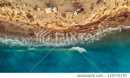 Two caravans solar panels on roof camp on seashore. Aerial view Two caravans solar panels on roof camp on seashore. Aerial view 138570195