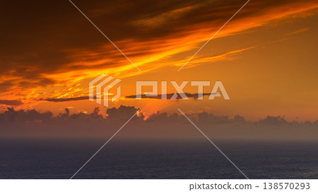 Sunset over sea surface 138570293