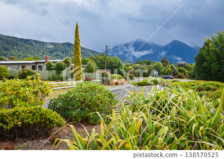Residential street with mountains in Manapouri Residential street with mountains in Manapouri 138570525