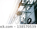 Electrical connection points on utility poles. 138570539