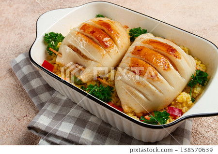 stuffed squid carcasses, baked in the oven, fried, with couscous, top view, homemade, no people, stuffed squid carcasses, baked in the oven, fried, with couscous, top view, homemade, no people, 138570639