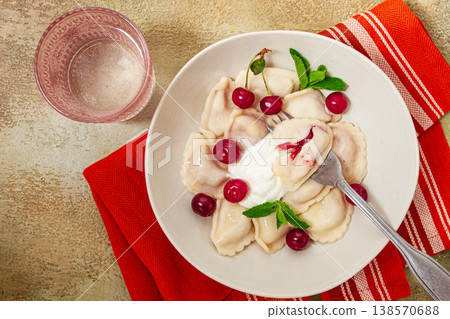 Traditional dumplings with cherries and yogurt, close-up, no people, Traditional dumplings with cherries and yogurt, close-up, no people, 138570688