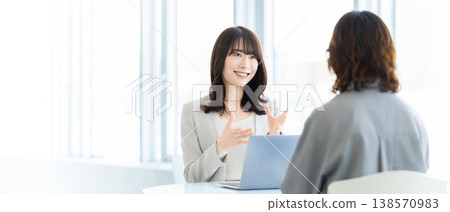 Two women/businesswomen having a meeting Two women/businesswomen having a meeting 138570983