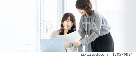Two women/businesswomen having a meeting Two women/businesswomen having a meeting 138570984