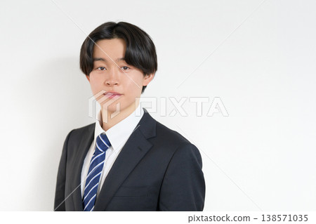 A portrait of a clean-cut young businessman. A portrait of a clean-cut young businessman. 138571035