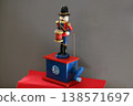 This skillfully crafted wooden drummer figurine is presented in vibrant, saturated colors. 138571697