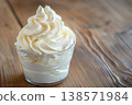 Glass with whipped cream close up, fluffy texture, dessert and lifestyle concept 138571984