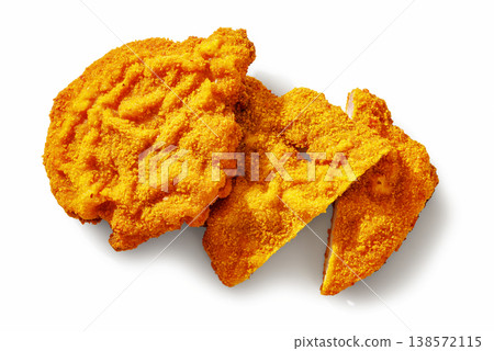 Two golden breaded schnitzel on a white background 138572115