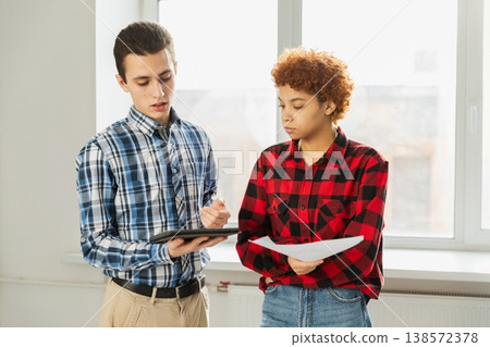 Diverse colleagues business people working on office. Startup business group working as team to find solution to problem. Happy multiracial corporate professional team discussing project ideas 138572378