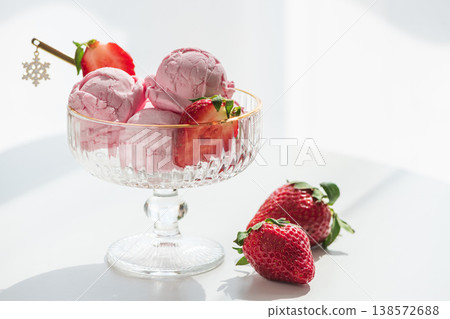Strawberry Ice Cream with Fresh Strawberries on White Table Strawberry Ice Cream with Fresh Strawberries on White Table 138572688