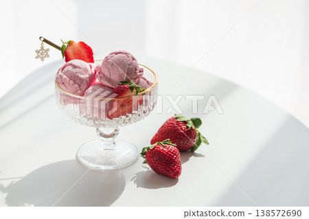 Strawberry Ice Cream with Fresh Strawberries on White Table Strawberry Ice Cream with Fresh Strawberries on White Table 138572690