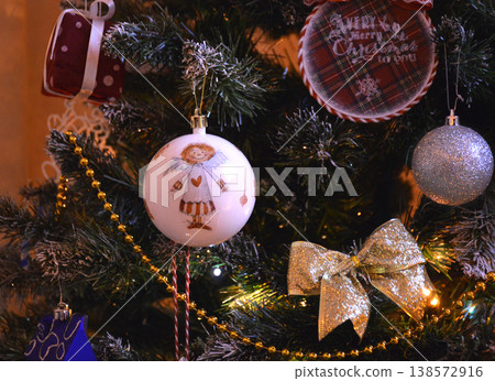 Christmas tree and yellow bow on the Christmas tree 138572916