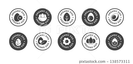 Organic Egg Round Badge Set with Text, Farm Labels and Stamp Style with Icons, Natural Product Packaging Design Organic Egg Round Badge Set with Text, Farm Labels and Stamp Style with Icons, Natural Product Packaging Design 138573311