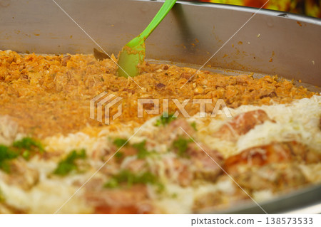 Cooked cabbage and pork knuckle in big pot. Cooked cabbage and pork knuckle in big pot. 138573533