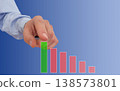 Business hand selecting chart bar on blue background for analytics performance strategy control growth and ranking 138573801