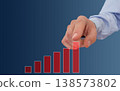 Business hand selecting growth graph chart on blue background for analytics performance strategy planning and success 138573802
