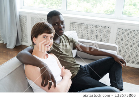 Young man watching TV Young man watching TV 138573806