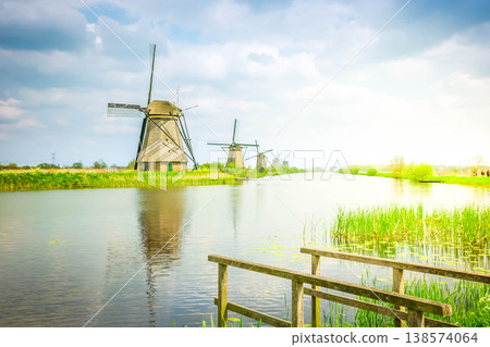 dutch windmills in summer day 138574064