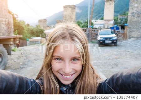 Little girl selfie in Mestia, Georgia Little girl selfie in Mestia, Georgia 138574407