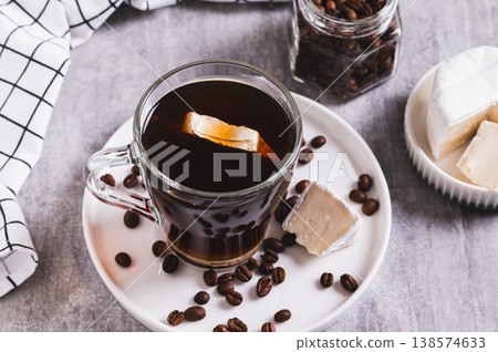 Espresso brie coffee in a cup and cheese in a bowl on the table Espresso brie coffee in a cup and cheese in a bowl on the table 138574633