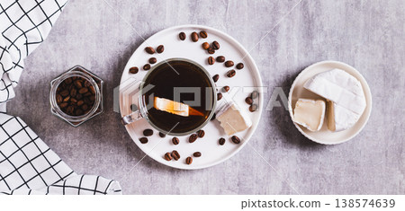 Espresso brie coffee in a cup and cheese in a bowl on the table top view web banner Espresso brie coffee in a cup and cheese in a bowl on the table top view web banner 138574639