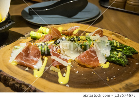 Delicious grilled asparagus Delicious grilled asparagus 138574675