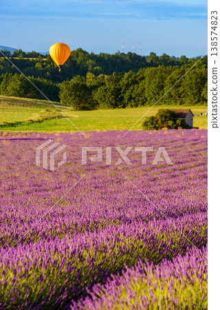 Hot air balloon flying in sky. Provence in France. Tourism and adventure concept. Hot air balloon flying in sky. Provence in France. Tourism and adventure concept. 138574823