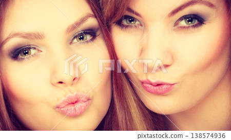 Charming positive female siblings. Charming positive female siblings. 138574936