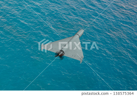 Military drone performs attack mission over sea area of Middle East region Military drone performs attack mission over sea area of Middle East region 138575364