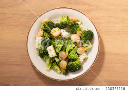 Broccoli, squid, and shrimp stir-fried with salt. Broccoli, squid, and shrimp stir-fried with salt. 138575536