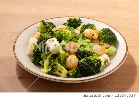 Broccoli, squid, and shrimp stir-fried with salt. Broccoli, squid, and shrimp stir-fried with salt. 138575537