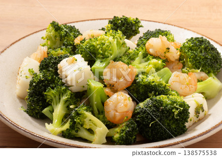Broccoli, squid, and shrimp stir-fried with salt. Broccoli, squid, and shrimp stir-fried with salt. 138575538