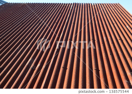 Rusty corrugated tin roof Rusty corrugated tin roof 138575544