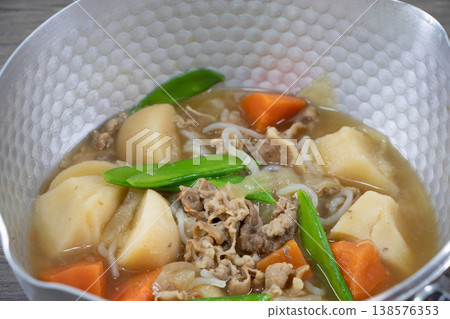 Nikujaga (Japanese meat and potato stew) in a Yukihira pot Nikujaga (Japanese meat and potato stew) in a Yukihira pot 138576353