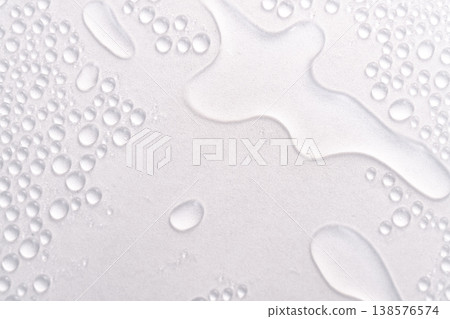 Texture of water droplets and water stains scattered on a white surface Texture of water droplets and water stains scattered on a white surface 138576574