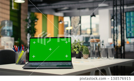 Chroma key isolated display shown on a modern laptop in the office, empty business workspace for the human resources department prepared for hiring process and interviews. Chroma key. Chroma key isolated display shown on a modern laptop in the office, empty business workspace for the human resources department prepared for hiring process and interviews. Chroma key. 138576915