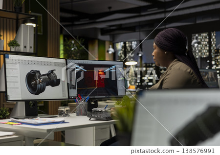 Male IT engineer uses AI techniques to create video game and a turbine, futuristic gaming design for a Mars station project. Sci fi system for a modern game lobby, professional software. 138576991