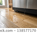 Dishwasher water leak on wooden kitchen floor house insurance claim 138577170