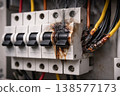 Electrical panel fire with sparks and smoke from circuit breakers 138577173
