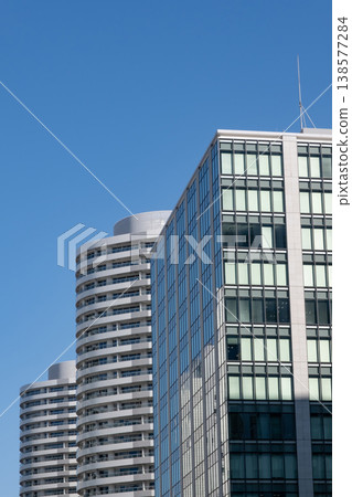 Skyscrapers in the blue sky Skyscrapers in the blue sky 138577284