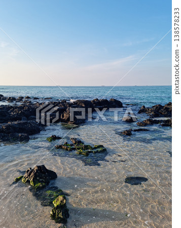 This is a Jeju seascape with basalt rocks. 138578233